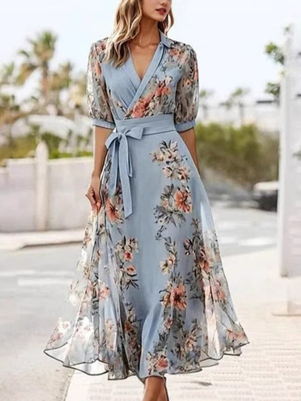 Vestido midi floral con lazo en la cintura