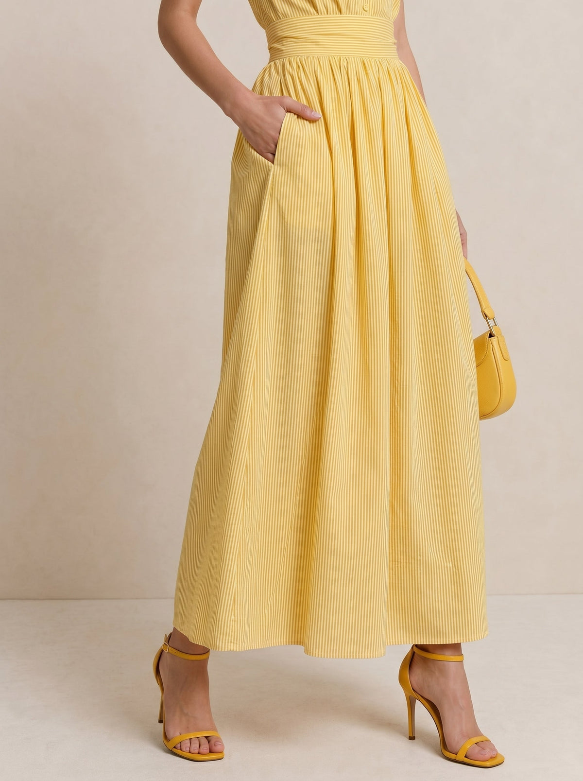Vestido midi a rayas con bolsillos