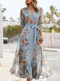 Vestido midi floral con lazo en la cintura