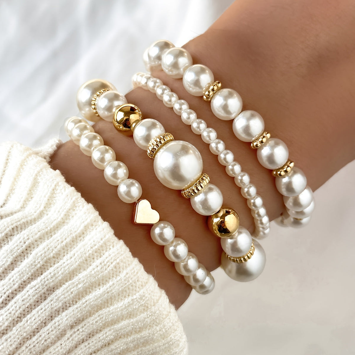 Set de pulseras con corazones de perla